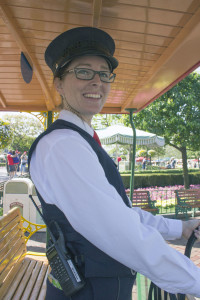 Alyssa, a cast member working on the Main Street U.S.A. Horse Trolley line, prepares to guide her horse down the street from the hub.