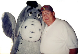 Tim Strauch II is dressed as Eeyore, and is pictured with his father, Tim Strauch I. Used by permission.