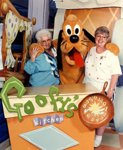 Tim Strauch II is dressed as Pluto in this photo. On the left is his grandmother, on his right is his mother. Used by permission.