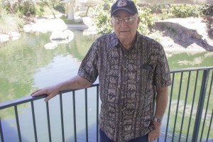 John Waite, a Disneyland Alumni, is pictured on the dock of the location of the Motorboat Cruise attraction. John worked the attraction in its first days of operation in the 50s.